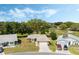 Charming single-story home featuring a well-manicured lawn and attached two-car garage next to a golf course at 6133 Seagull Ln, Lakeland, FL 33809