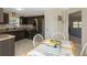 Bright kitchen featuring stainless steel appliances and a breakfast nook at 6133 Seagull Ln, Lakeland, FL 33809