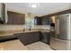 Kitchen featuring stainless steel appliances, granite countertops and modern cabinetry at 6133 Seagull Ln, Lakeland, FL 33809