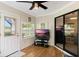 Bright sunroom with access to the outdoors and a view at 6133 Seagull Ln, Lakeland, FL 33809