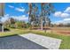 Spacious backyard with a paver patio, perfect for entertaining, and backing to a treed preserve at 7699 Sw 74Th Loop, Ocala, FL 34481