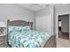 Bedroom with ceiling fan, closet, and full sized bed at 7699 Sw 74Th Loop, Ocala, FL 34481