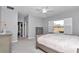 Comfortable bedroom with carpet, shuttered windows, and neutral colors at 7699 Sw 74Th Loop, Ocala, FL 34481