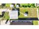An aerial view shows the spacious backyard and the surrounding landscape at 859 Neuse Ave, Orlando, FL 32804