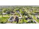Aerial view featuring home with backyard gazebo, surrounded by lush greenery at 859 Neuse Ave, Orlando, FL 32804