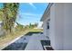 Charming home featuring a well-maintained backyard with a paved walkway at 859 Neuse Ave, Orlando, FL 32804