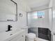 Modern bathroom featuring a tiled shower and new vanity at 859 Neuse Ave, Orlando, FL 32804