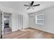 Bedroom featuring wood-look flooring and closet at 859 Neuse Ave, Orlando, FL 32804