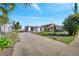 Charming home with a well-maintained front yard and a paved driveway at 859 Neuse Ave, Orlando, FL 32804