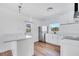 Modern kitchen featuring sleek countertops, stainless steel appliances, and updated flooring for a fresh, contemporary feel at 859 Neuse Ave, Orlando, FL 32804