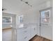 Bright kitchen area with white cabinets and new countertops at 859 Neuse Ave, Orlando, FL 32804