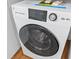 Close-up of new GE washer and dryer unit in a home, featuring advanced settings at 859 Neuse Ave, Orlando, FL 32804