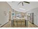 Open concept kitchen features a large island, stainless steel appliances, and seamless access to outdoor spaces at 868 Shell Ln, Longwood, FL 32750