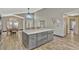 Spacious kitchen island with ample storage enhances this home's entertainment capability at 868 Shell Ln, Longwood, FL 32750