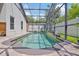 Screened pool with ample patio space, manicured landscaping, and white privacy fence at 868 Shell Ln, Longwood, FL 32750