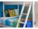 bedroom with Mario Brothers themed bunk beds and a white ladder at 8816 Cruden Bay Ct, Davenport, FL 33896