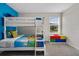 bedroom with carpet, bunkbeds and a Lego block toy chest at 8816 Cruden Bay Ct, Davenport, FL 33896