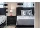 Charming bedroom featuring twin beds with themed bedding and a decorative Mickey Mouse pillow at 8816 Cruden Bay Ct, Davenport, FL 33896