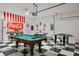 Inviting game room featuring a pool table, foosball, and a Coca-Cola themed bar area for entertainment at 8816 Cruden Bay Ct, Davenport, FL 33896