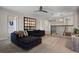 Second floor loft area showcasing comfortable seating, stylish decor, and an open layout at 8816 Cruden Bay Ct, Davenport, FL 33896