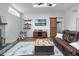 Bright living room with a fireplace and modern decor at 9235 Everwood St, Orlando, FL 32825