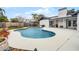 Beautiful backyard pool with concrete patio perfect for outdoor entertaining and relaxation at 9235 Everwood St, Orlando, FL 32825