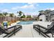 Backyard pool with an expansive patio that is great for entertaining at 9235 Everwood St, Orlando, FL 32825