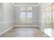 Sunlit bedroom with hardwood floors, large windows, and ample space at 442 Flora Creek Ct, Lake Mary, FL 32746