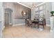 Elegant dining room featuring modern lighting, stylish wall decor, and comfortable seating at 442 Flora Creek Ct, Lake Mary, FL 32746