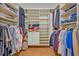 Spacious walk-in closet with ample shelving and hanging space for organized storage at 1002 Ohanlon Ct, Oviedo, FL 32765