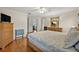 Large main bedroom with wood floors, a ceiling fan, and neutral paint at 1002 Ohanlon Ct, Oviedo, FL 32765