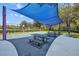 Community playground featuring picnic tables, basketball court, and sun shade at 1002 Ohanlon Ct, Oviedo, FL 32765