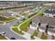 Aerial view of a residential community and neighborhood at 1195 Boardwalk Pl, Kissimmee, FL 34747