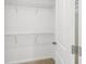 Spacious walk-in closet with built-in shelving for organized storage at 1195 Boardwalk Pl, Kissimmee, FL 34747