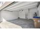 Spacious garage with white walls and concrete flooring at 1195 Boardwalk Pl, Kissimmee, FL 34747