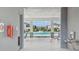 View of the community pool area featuring comfortable seating and a refreshing swimming space at 1195 Boardwalk Pl, Kissimmee, FL 34747