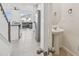 Convenient downstairs powder room located near the kitchen and living area at 1195 Boardwalk Pl, Kissimmee, FL 34747