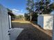 Spacious backyard with grass, a shed, and mature trees for outdoor enjoyment at 1289 E Hancock Dr, Deltona, FL 32725