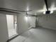 Clean garage offering access to the laundry room and a side entry door at 1289 E Hancock Dr, Deltona, FL 32725