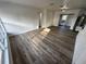 Bright living room features fresh paint and modern floors, creating a welcoming atmosphere at 1289 E Hancock Dr, Deltona, FL 32725