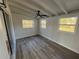 Bright sunroom with new flooring and multiple windows, perfect for relaxation at 1289 E Hancock Dr, Deltona, FL 32725