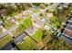 Aerial view of a single-Gathering home with a large yard in a residential neighborhood at 1315 Overdale St, Orlando, FL 32825