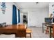 Bright dining area with an adjacent laundry room and access to the kitchen at 1315 Overdale St, Orlando, FL 32825