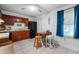 Cozy kitchen featuring a dining area with a drop leaf table and tile flooring at 1315 Overdale St, Orlando, FL 32825