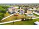 Aerial shot of the neighborhood highlighting backyard pools, landscaping, and community layout at 14318 Fieldstone Lake Way, Orlando, FL 32824
