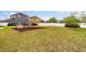 Large backyard with playground area and ample green space, perfect for outdoor enjoyment at 14318 Fieldstone Lake Way, Orlando, FL 32824