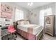 Bright bedroom with decor and desk setup at 14318 Fieldstone Lake Way, Orlando, FL 32824