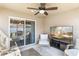 Inviting screened patio featuring comfortable seating and a great backyard view at 1575 Eucalyptus Way, Davenport, FL 33837