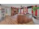 Spacious living room featuring a built-in entertainment center and comfortable seating area at 174 Yellow Snapdragon Dr, Davenport, FL 33837