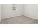 Cozy bedroom with natural light and carpet flooring at 1893 Rafton Rd, Apopka, FL 32703